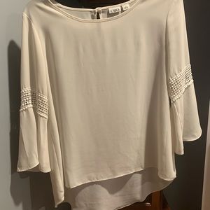 Cato blouse. Very good condition. Ivory color. Longer tail length.